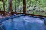 View of the Cartecay River from the terrace level hot tub